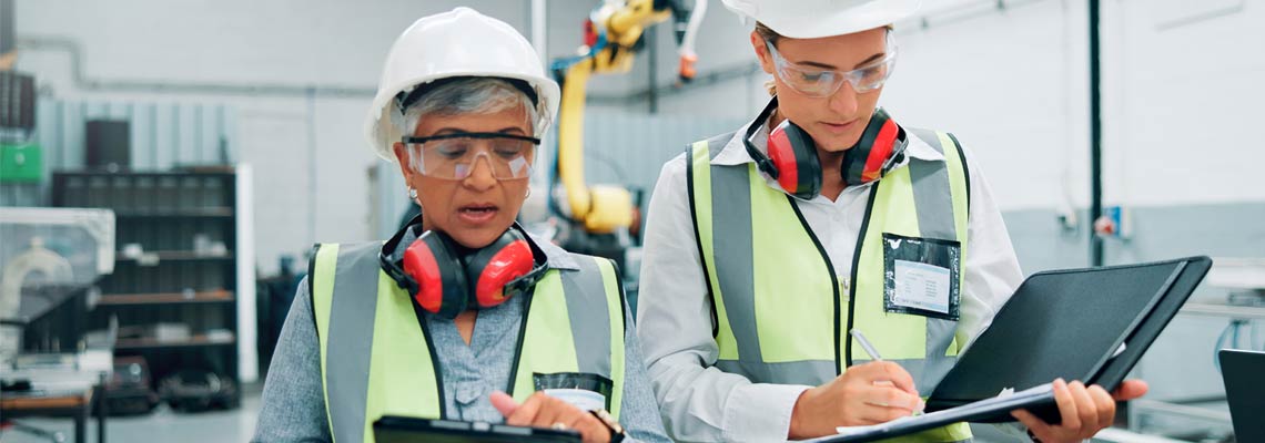 engineers and tablet with team for checklist