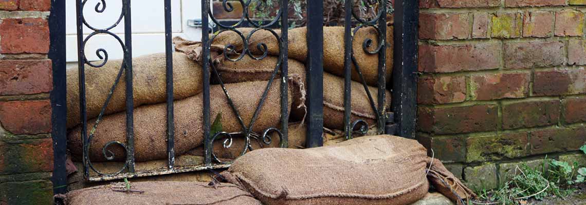 Sandbags in front of a gate used as flood defences