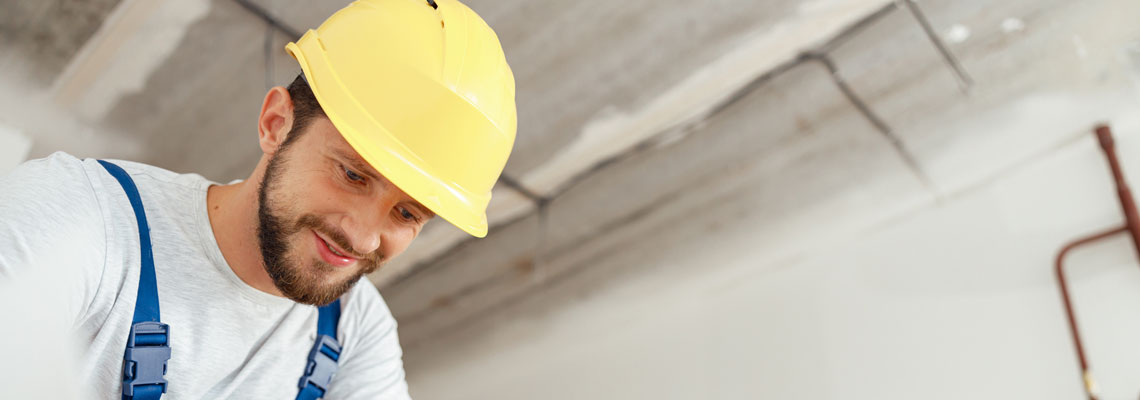 man doing house renovation indoors