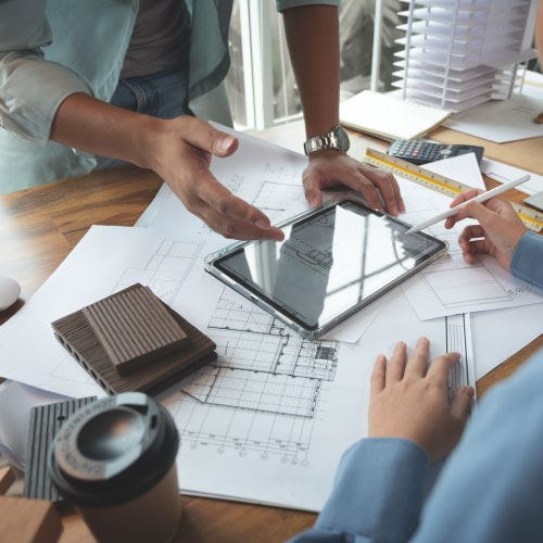 Architects designers discussing building design