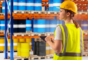 manager is counting chemical barrels