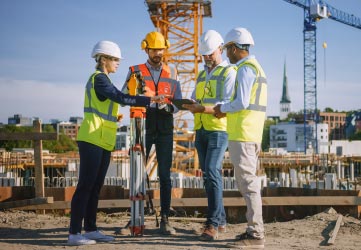 Team of specialists on construction site