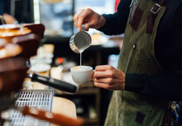 Barista making cappuccino