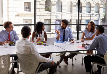 Corporate business team and manager in a meeting