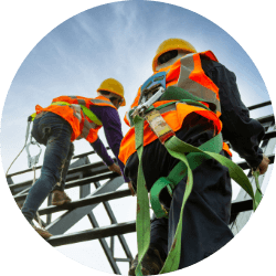 Construction worker wearing safety harness