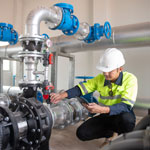 Engineer checking water pressure