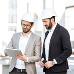 Two engineers standing on the constructure site