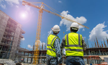 Civil engineer checking work on the construction site