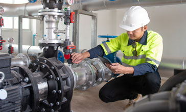 Engineer checking water pressure