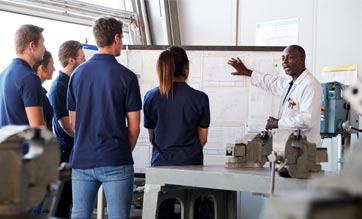 Engineering apprentices watching presentation