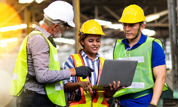 engineers looking at laptop