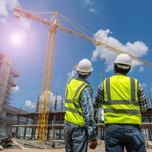 Civil engineer checking work on the construction site