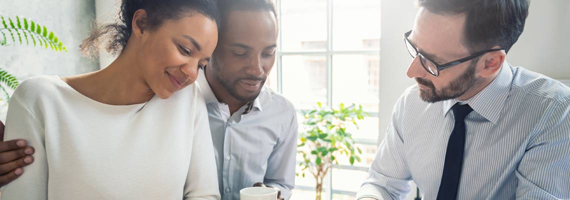 Couple talking to an advisor