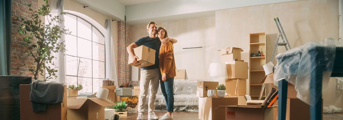 couple moving in to a new house