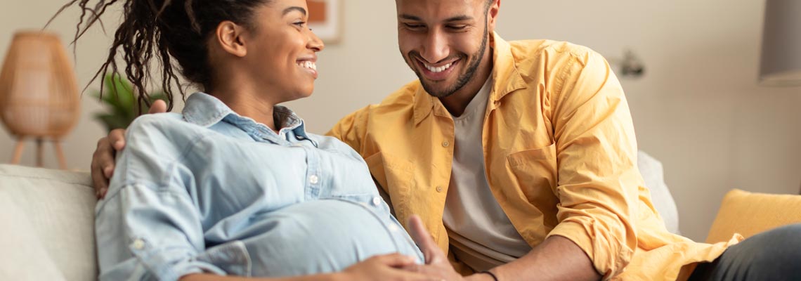 smiling business woman using laptop in the office