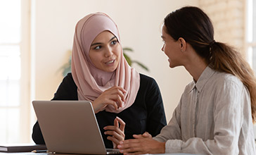 Female colleagues having a discussion