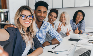 diverse group of young people in the office