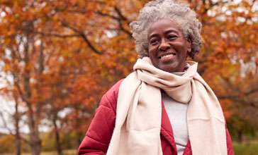 happy mature woman in the park