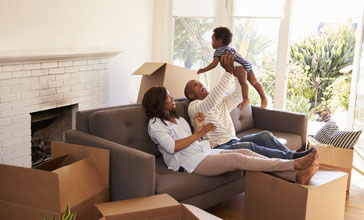 young family unpacking