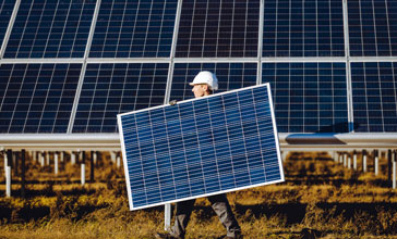 Engineer installing solar panels