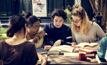 group of young people collaborating
