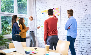 group of people working together in the office