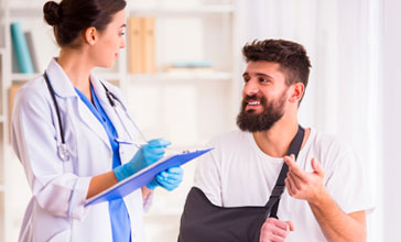 man being checked by a doctor