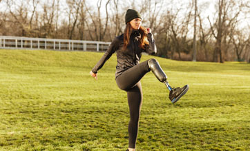 disabled woman exercising in the park