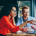 woman and man working together