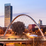 The Hulme Arch Bridge and Beetham Tower on a skyline of Manchester