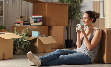 woman unpacking boxes