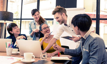group of young people brainstorming