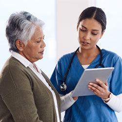 female doctor talking to a patient