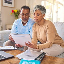 mature couple checking documents