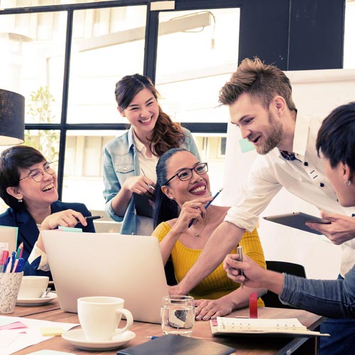 group of young people collaborating