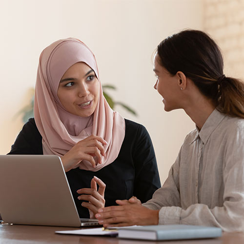 Female colleagues having a discussion