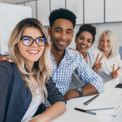 diverse group of young people in the office