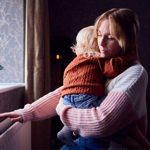 mother and daughter checking radiators
