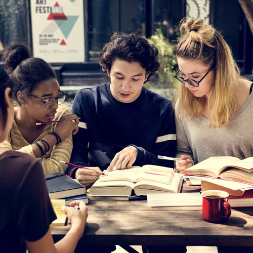 group of young people collaborating