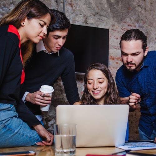 group of young people collaborating
