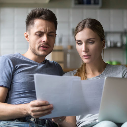 couple looking at documents
