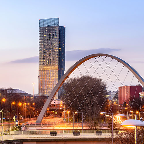 The Hulme Arch Bridge and Beetham Tower on a skyline of Manchester