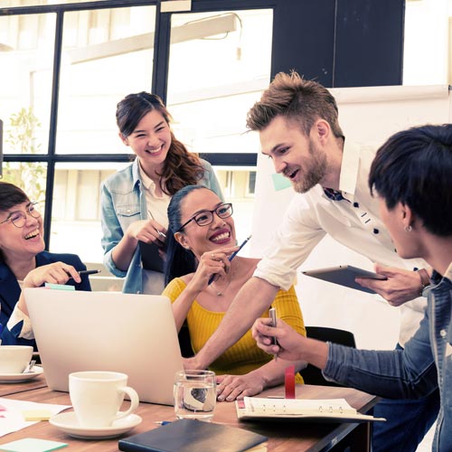 group of young people collaborating