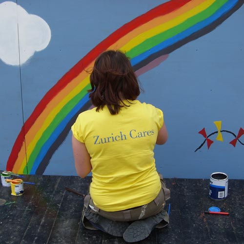 volunteer painting walls