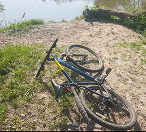 bike left by the river