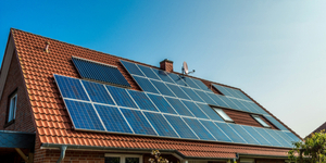 flat solar panels sitting on angled roof