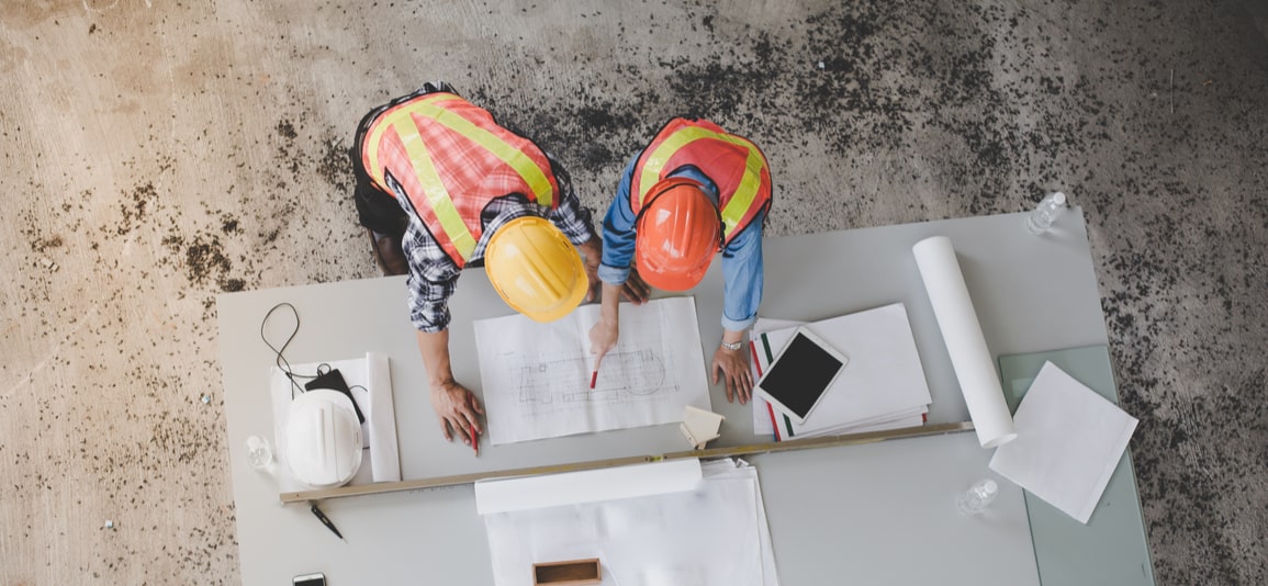 builders looking at plans