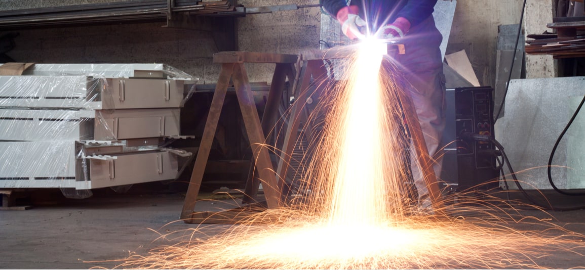 metal worker producing hot work sparks