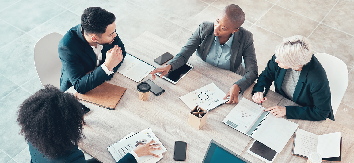 Business people, meeting and paper with charts for sales planning, portfolio and company report.