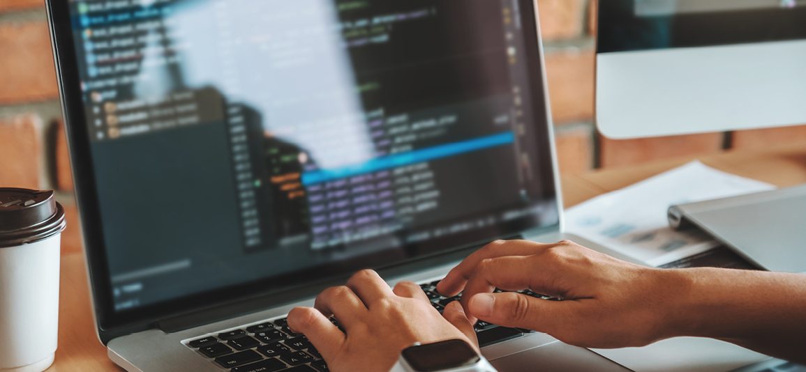 Developing programmer team reading computer codes 